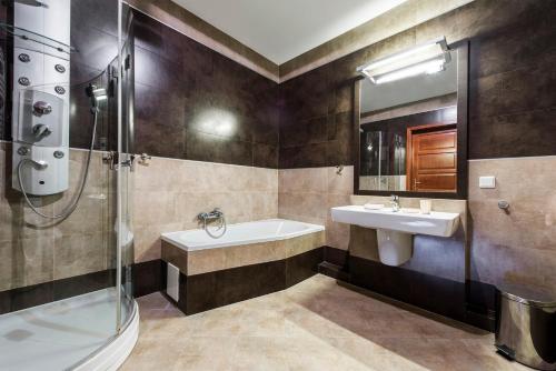 Ванная комната в MW Apartamenty - Sea Towers