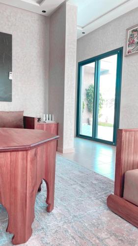 Ein Sitzbereich in der Unterkunft Villa Mazigh & piscine