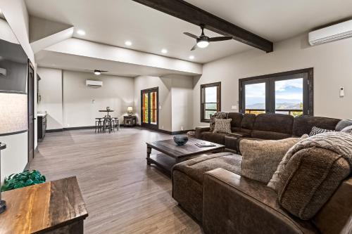 a living room with a couch and a table at Peaceful Vista in Sevierville