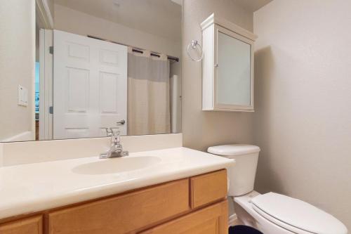 a bathroom with a sink and a toilet at The Fountainview Getaway in Fountain Hills