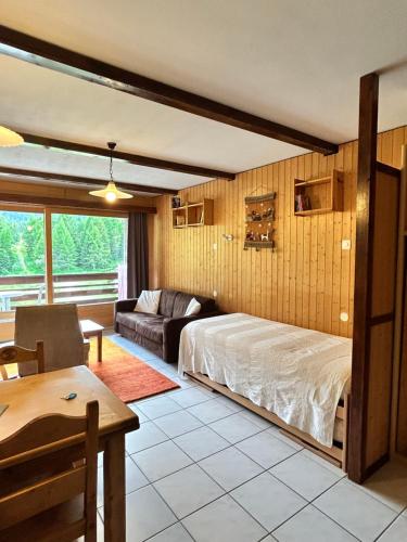 Postel nebo postele na pokoji v ubytování Appartement-Siviez