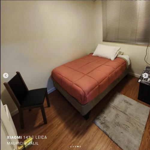 En eller flere senge i et værelse på Aventura Patagonica 4