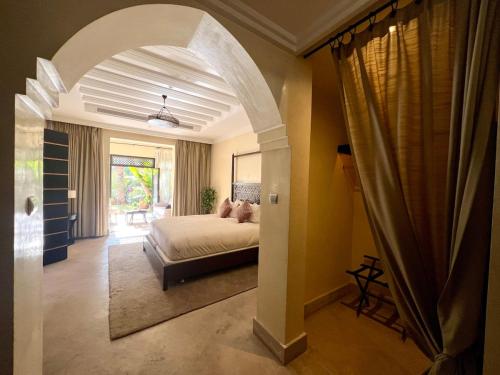 Ένα ή περισσότερα κρεβάτια σε δωμάτιο στο Riad in Hotel M Avenue