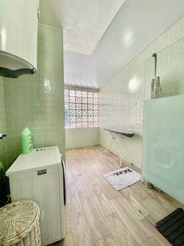 a bathroom with a shower and a sink in a room at Apartment-House La Mata Torrevieja in Torrevieja