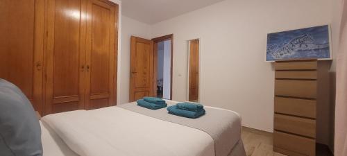 Postel nebo postele na pokoji v ubytování Sabbia Suites Casa Gloria