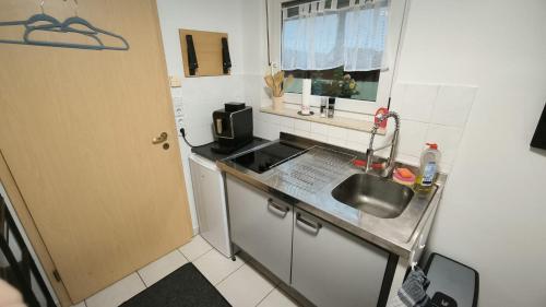 Kuchyň nebo kuchyňský kout v ubytování Monteurzimmer Eschenbach