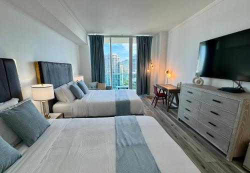 Ένα ή περισσότερα κρεβάτια σε δωμάτιο στο Balcony Ocean View ! WiFi - Pool - Gym - Parking