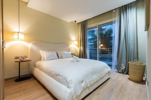 Postel nebo postele na pokoji v ubytování Modern & Chic APT Prestigia