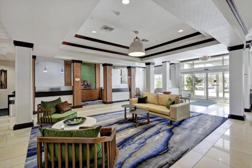 a living room with a couch and a table at Fairfield Inn and Suites by Marriott San Antonio Boerne in Boerne