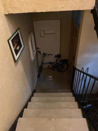 a stairway with a bike parked next to a building at El Balcón de SúperAnfitrión Coyoacan in Mexico City