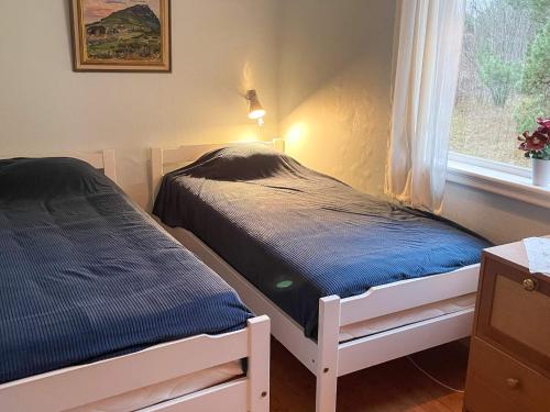 Postel nebo postele na pokoji v ubytování 4 star holiday home in SÖLVESBORG