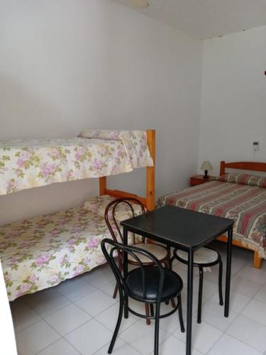 Katil atau katil-katil dalam bilik di Hotel Nehuen