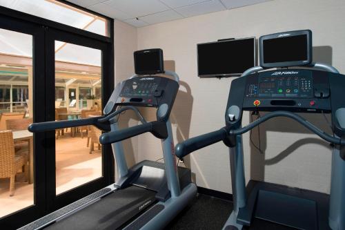 a gym with a treadmill and a mirror at Fairfield Inn & Suites by Marriott Lynchburg Liberty University in Lynchburg