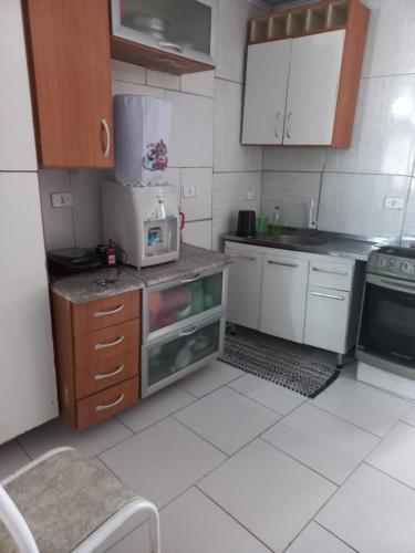 Kuchyň nebo kuchyňský kout v ubytování Casa da A'LICE
