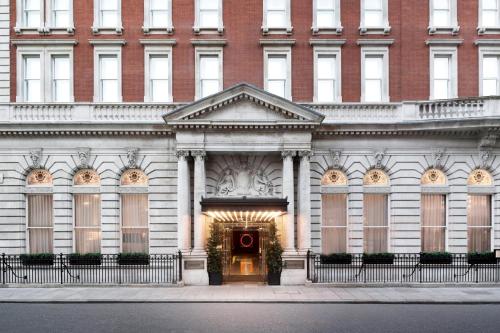 a large building with a door in front of it at The London EDITION in London