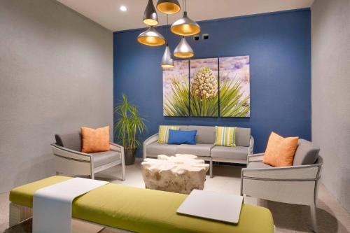 a living room with a couch and a table at Fairfield Inn & Suites by Marriott Rockport in Rockport