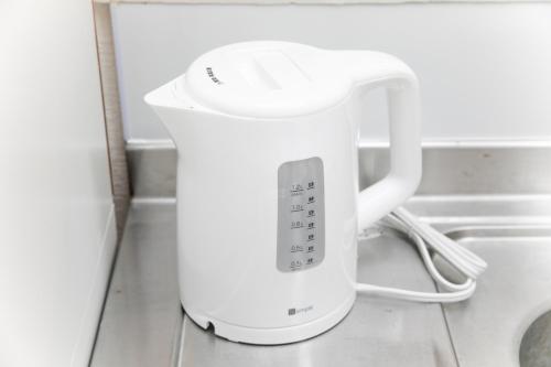 a white blender sitting on top of a counter at Miraie Yokkaichi Nishishinchi 2 in Yokkaichi