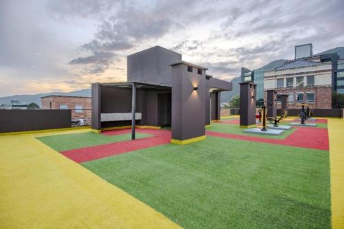 Zona de juegos infantil en Exclusive Aparta - Suite Full Parque de la 93