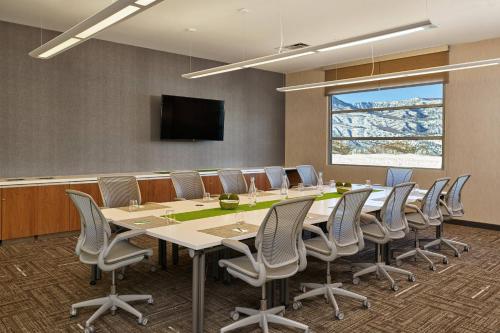 a conference room with a long table and chairs at Element Basalt - Aspen in Basalt