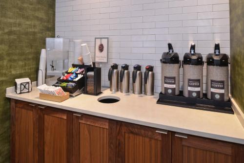 a counter with a bunch of bottles of wine on it at Fairfield Inn & Suites by Marriott Columbus Grove City in Grove City