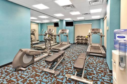 a gym with treadmills and elliptical machines at Fairfield Inn & Suites by Marriott Lexington North in Lexington