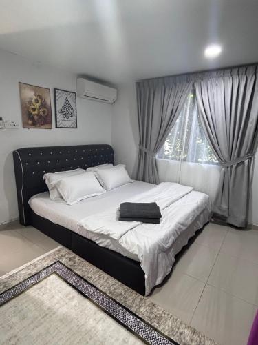 Tempat tidur dalam kamar di Nadrah Cottage
