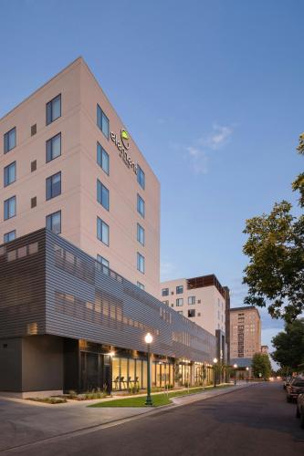 a rendering of a hotel building on a street at Element Denver Downtown East in Denver