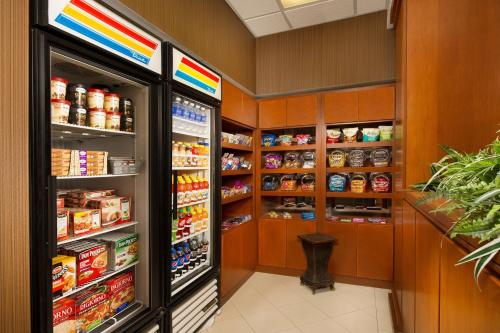 a large refrigerator with its doors open in a kitchen at Fairfield Inn & Suites by Marriott Marshall in Marshall