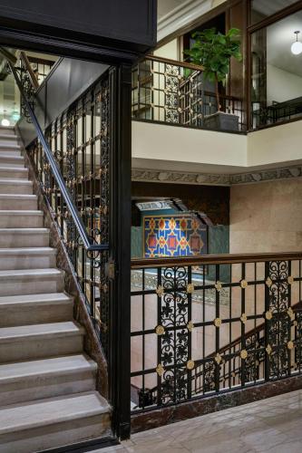 a staircase in a building with a stair railing at Element Detroit at the Metropolitan in Detroit
