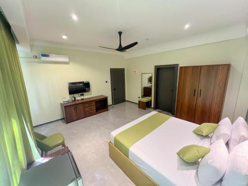 Postel nebo postele na pokoji v ubytování Ranowell Hotel