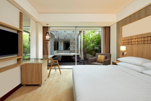 Ένα ή περισσότερα κρεβάτια σε δωμάτιο στο Fairfield by Marriott Bali Legian