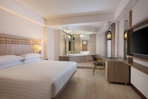Ένα ή περισσότερα κρεβάτια σε δωμάτιο στο Fairfield by Marriott Bali Legian