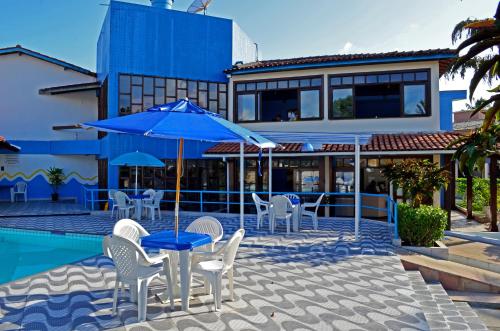 Bazén v ubytování Hotel Porto das Ancoras nebo v jeho okolí