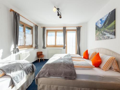 Posteľ alebo postele v izbe v ubytovaní Chalet in Zillertal near Ski Slopes