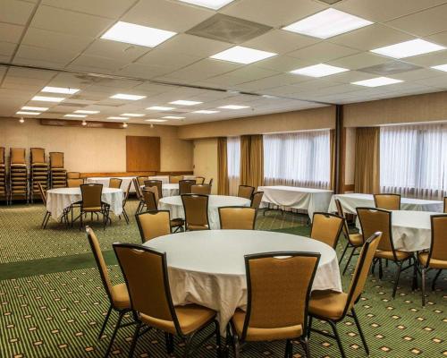 a conference room with tables and chairs and tablesktop at Quality Inn & Suites Goshen in Goshen