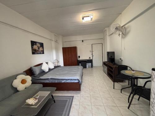 Ένα ή περισσότερα κρεβάτια σε δωμάτιο στο Monkey Apartment 4