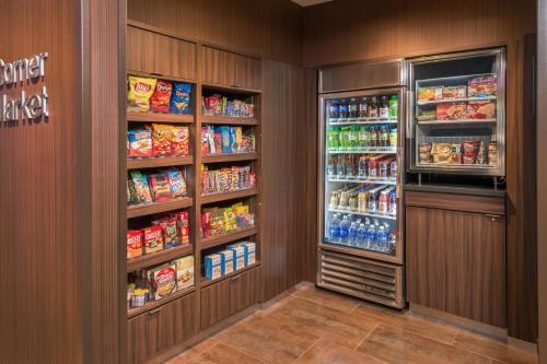 a room with two refrigerators with food and drinks at Fairfield Inn & Suites by Marriott Easton in Easton