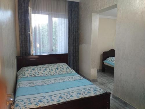 Postel nebo postele na pokoji v ubytování Family Hotel Andria