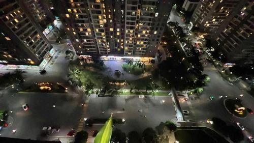 an aerial view of a city at night at VINHOME TIME CITY CĂN HỘ 2 PHÒNG NGỦ in Hanoi