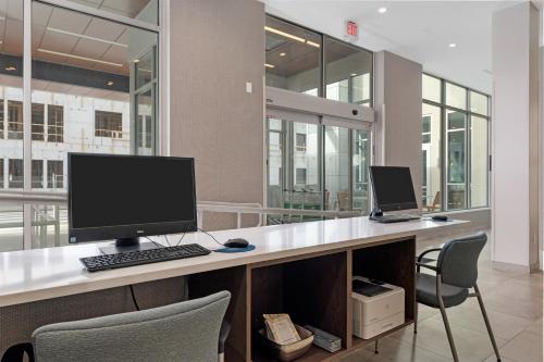 an office with a desk with a computer on it at Element Hampton Peninsula Town Center in Hampton