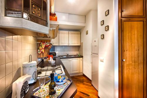 a kitchen with a stove and a counter top at la vista sul lago in Castel Gandolfo