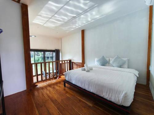 Ένα ή περισσότερα κρεβάτια σε δωμάτιο στο Lakeview01