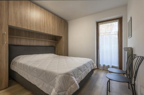 Giường trong phòng chung tại Zoe's Home