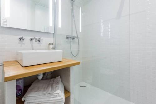Kylpyhuone majoituspaikassa Appartement St Michel