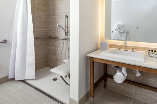a bathroom with a sink and a shower at Element Bend in Bend