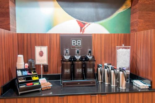 a counter with a bar with a btec coffee machine at Fairfield Inn & Suites by Marriott San Antonio Brooks City Base in San Antonio
