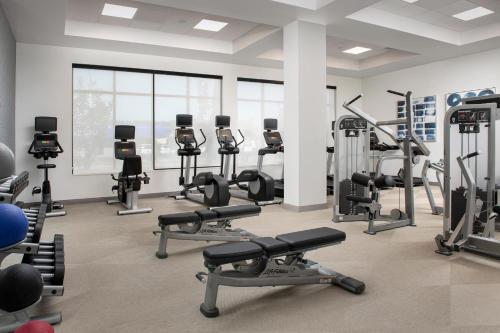 a gym with a lot of treadmills and machines at Element Seattle Sea-Tac Airport in Tukwila