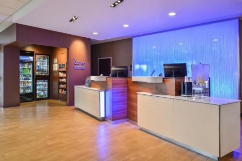 a lobby of a store with a large window at Fairfield Inn & Suites by Marriott Eugene East/Springfield in Eugene