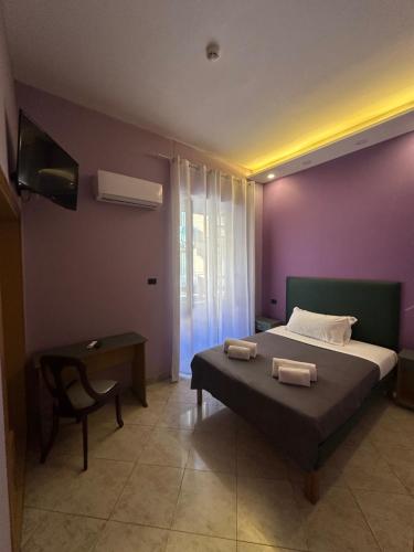 TV a/nebo společenská místnost v ubytování Smart Station Hotel