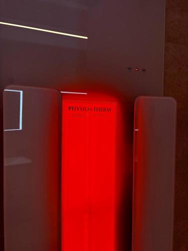 two refrigerators are standing next to each other at Boutique-Pension Jägerwirt in Scheffau am Wilden Kaiser
